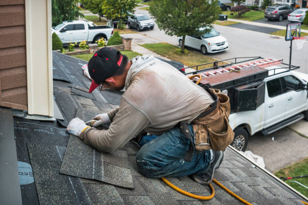 Professional Flat Roof Repair technician working in Estero, FL